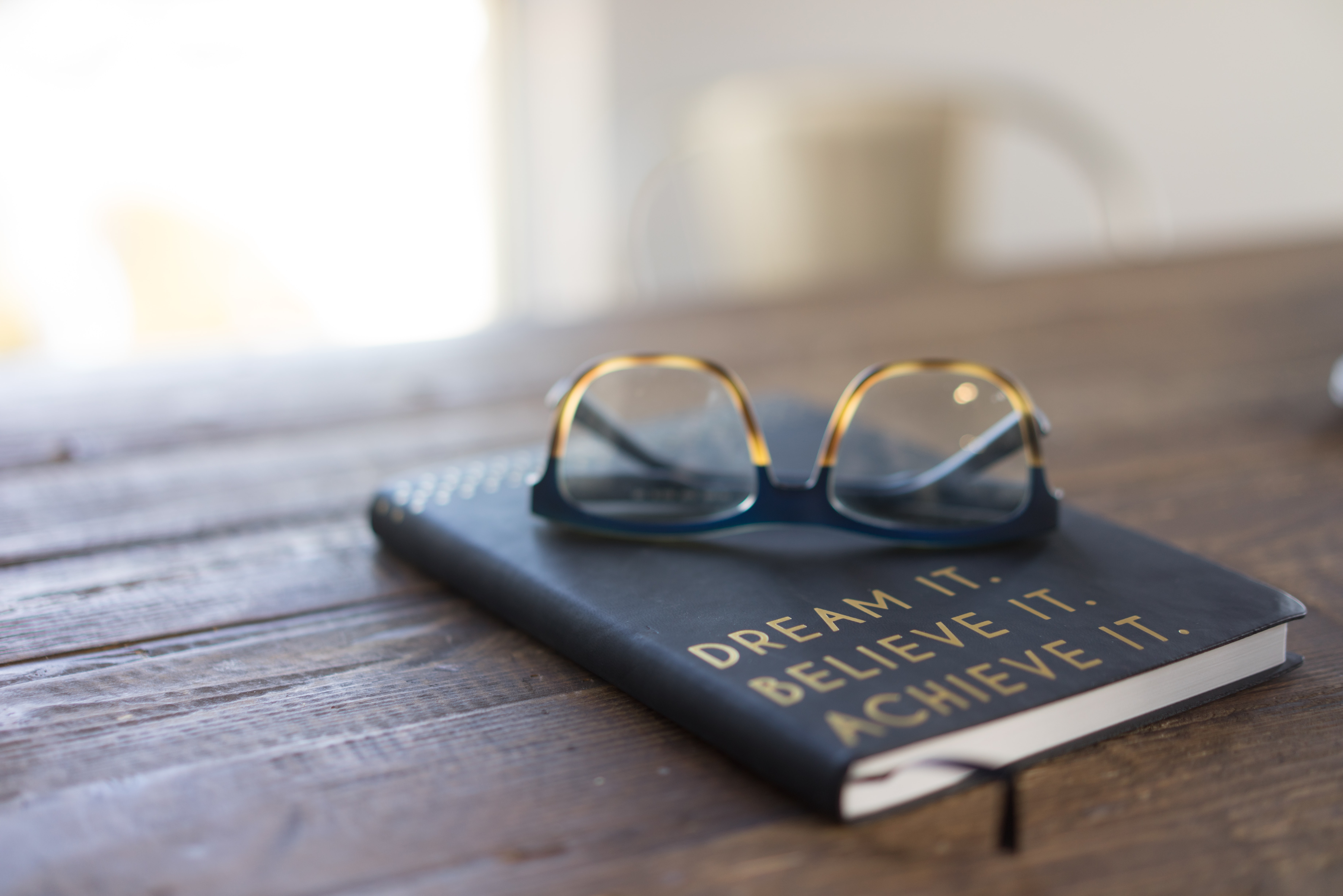 Book, glasses, text