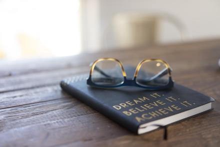 Book, glasses, text